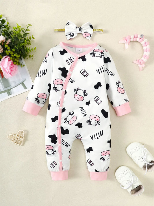 Combinaison pour bebe | Motif Vache Douce posée sur le tapis