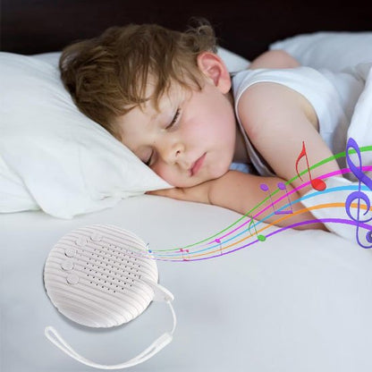 Veilleuse bruit blanc | DouxSommeil placée dans le lit de l'enfant
