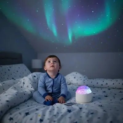 Veilleuse enfant | Projection Féerique avec l'enfant assis sur le lit